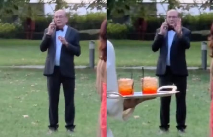 Gilmar Mendes ao telefone durante casamento na Itália — Foto: Obtida pela coluna de Lauro Jardim